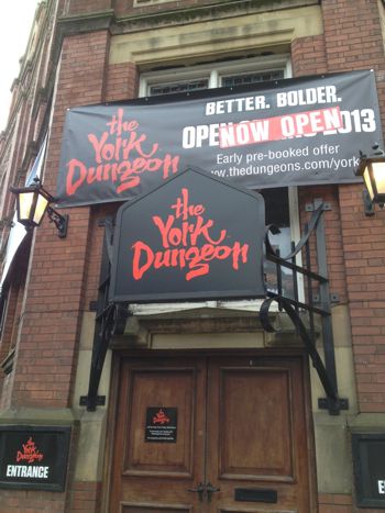 Promotional banner hanging outside the York Dungeons