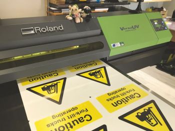 Versa UV printer printing caution signs