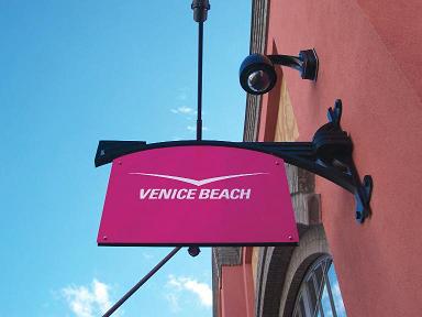 Hanging sign saying 'Venice Beach'