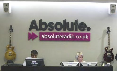SignTrade sign for Absolute Radio, shown in reception area.