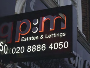 An estate agents sign.