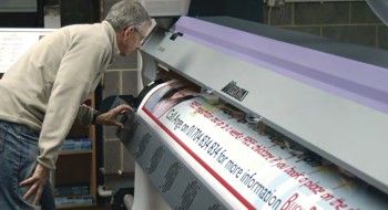 Charles Coldwell examining the output of the JV33 printer