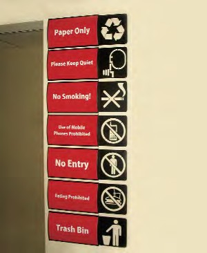 A display of several laser cut pictogram end caps attached to a V150X250mm (10") wall frame sign