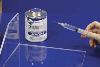 SCIGRIP's Sign and Display Adhesives applied with a syringe
