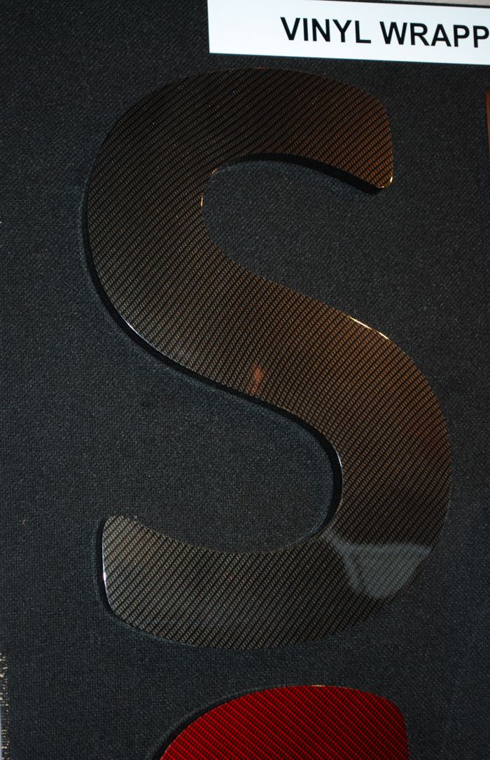 Carbon fibre effect built up letter created and wrapped by North East Signs.