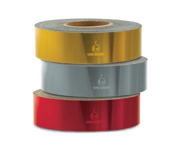 Three different coloured rolls of Nikkalite marking tape stacked on top of each other