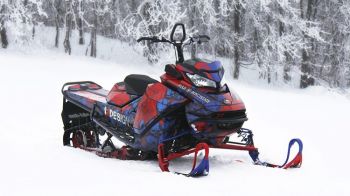 Snowmobile made with ProTec series 3960 standing in the snow