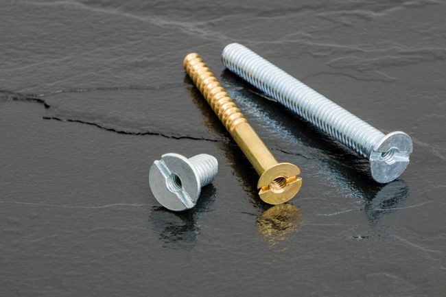 Drilled and Tapped Screws - Brass wood screw and 2 zinc plated machines screws.