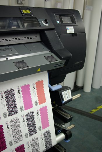 Matic Media's Fingernails coming out of a large format printer