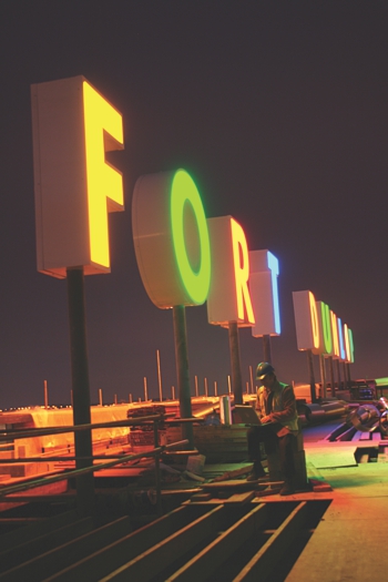 A multi-coloured Fort Dunlop Sign outside