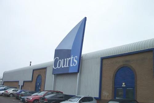 Courts premises with illuminated Flexface signage.