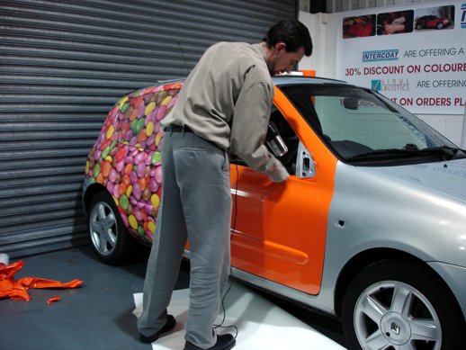 Car being wrapped by Steve.