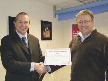 Amari Plastics Bristol Branch Manager Rob Weeks presenting the ARI Certificate to MD of Luminati Waycon, Steve Senior.