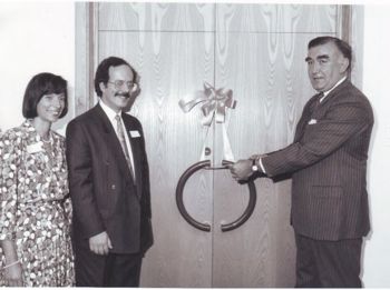 Janice and Geoffrey Fairfield with MP Michael Mates at the 1990 opening of the Fleet showroom.