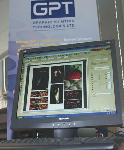 Monitor showing software with GPT banner behind.