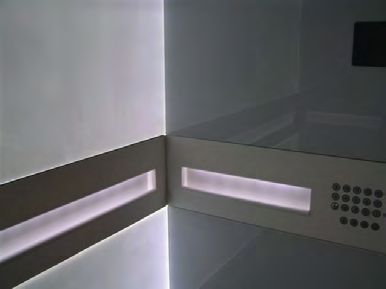 White glass illuminated wall using Prismex