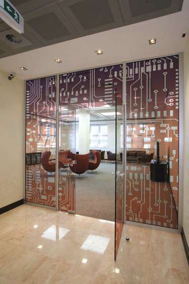 UV inkjet indoor printing application on a Madico supplied fire-rated polyester film used in glass wall of an office.