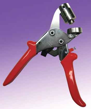 The Atech Handy Eye press, which is a handheld eyelet tool.
