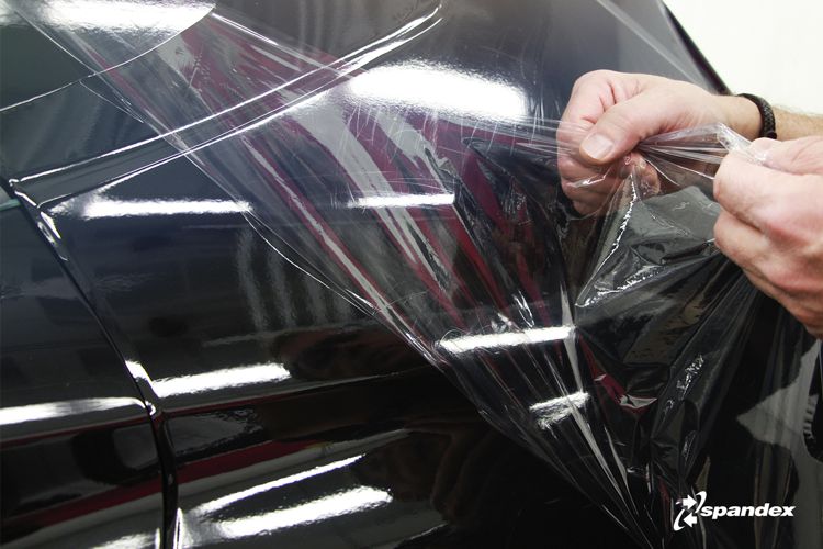3M Wrap Film Series 2080 being applied to a car.