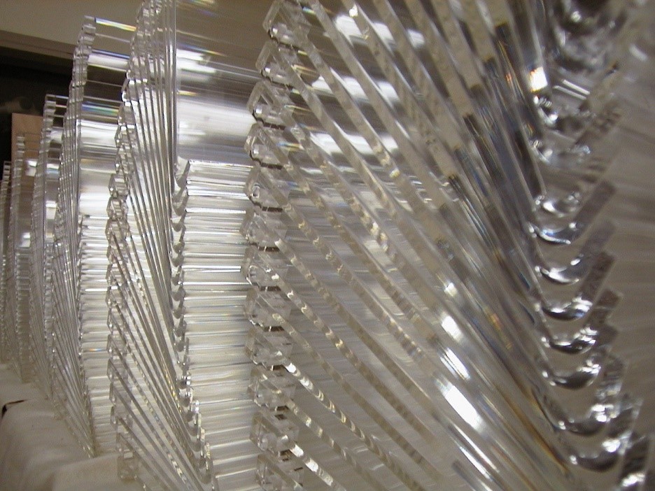 Polished and cut acrylic in piles after manufacturing