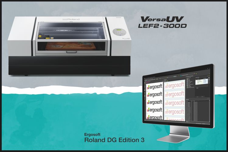 Roland VersaUV LEF2-300D printer with and computer screen showing some software on it.