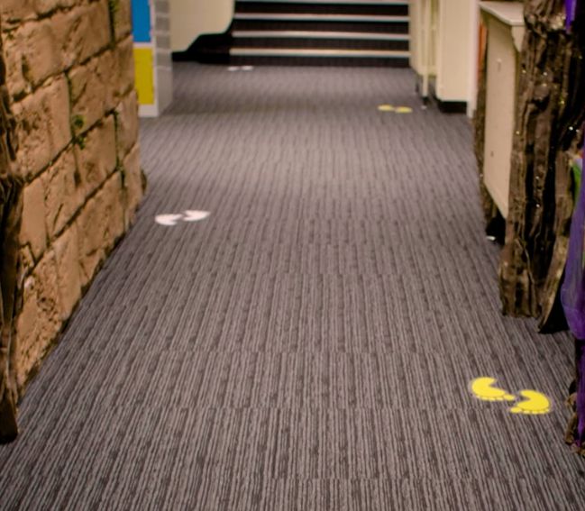 Floor graphics in a school corridor