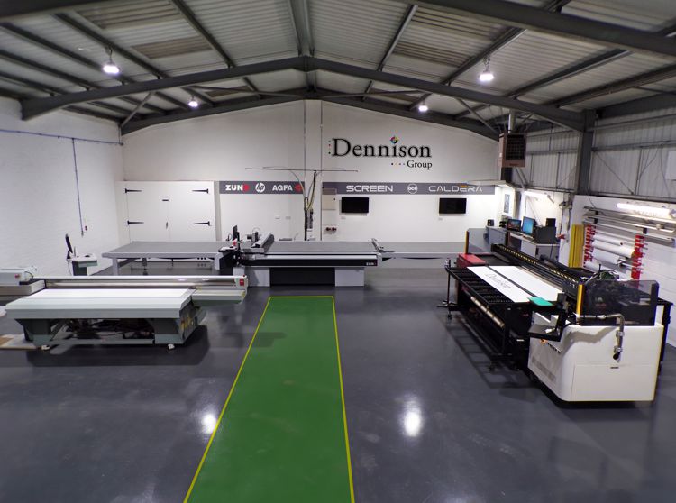 Large room with the Zund cutter installed at the Dennison Group.