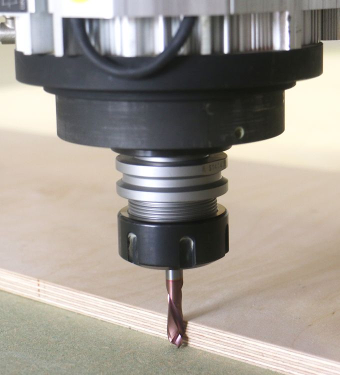 The Marathon Compression Tool in use on a AXYZ CNC router