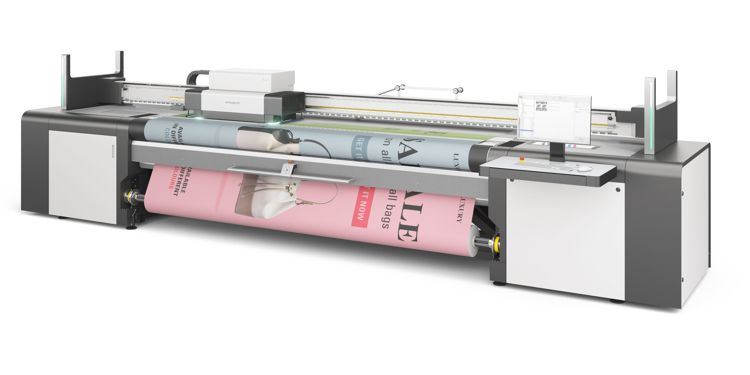 Wide format printer showing double-sided roll to roll printing.