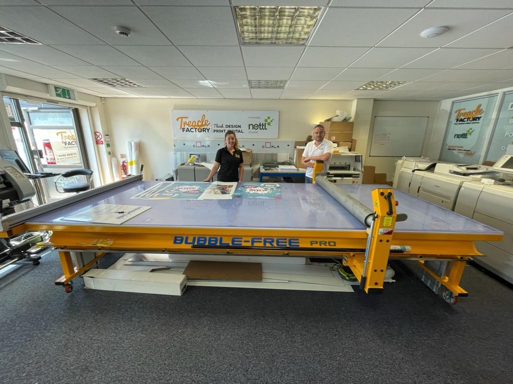A BubbleFree Pro flatbed applicator table from Josero.