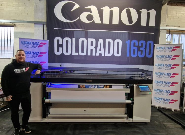 Josh Candy, Director, from featherflagstrade.co.uk with his new Canon Colorado 1630 wide-format UV printer
