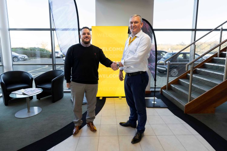 Josh Candy (left), Director at UK Feather Flags, shaking hands with Ross Bennett, Regional Sales Manager for Innotech Digital