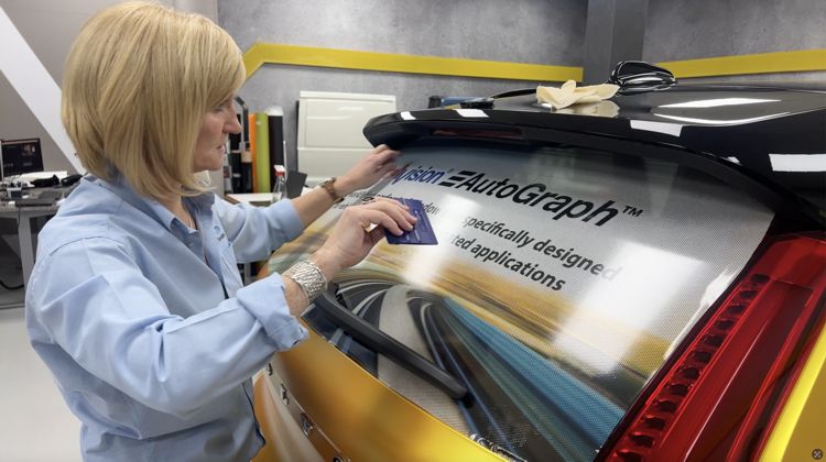Contra Vision Autograph being installed on a rear car window