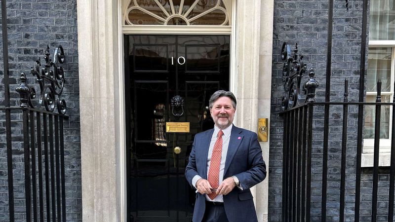 Charles Rogers, Chair of the IPIA, stands on front of number ten Downing Street