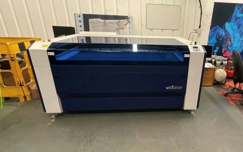 A laser machine inside a workshop