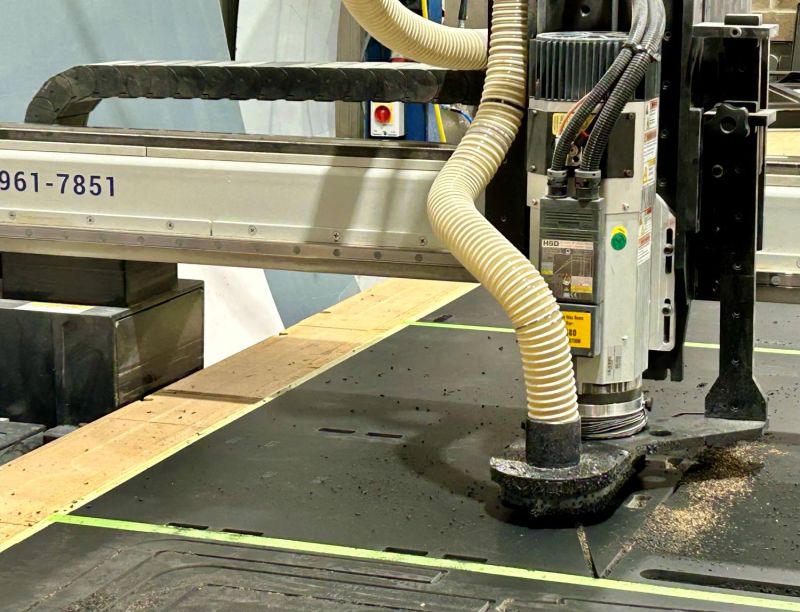 A close up of the Axyz machine in mid-cut through a material