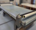 Rollover flatbed mounting and finishing table